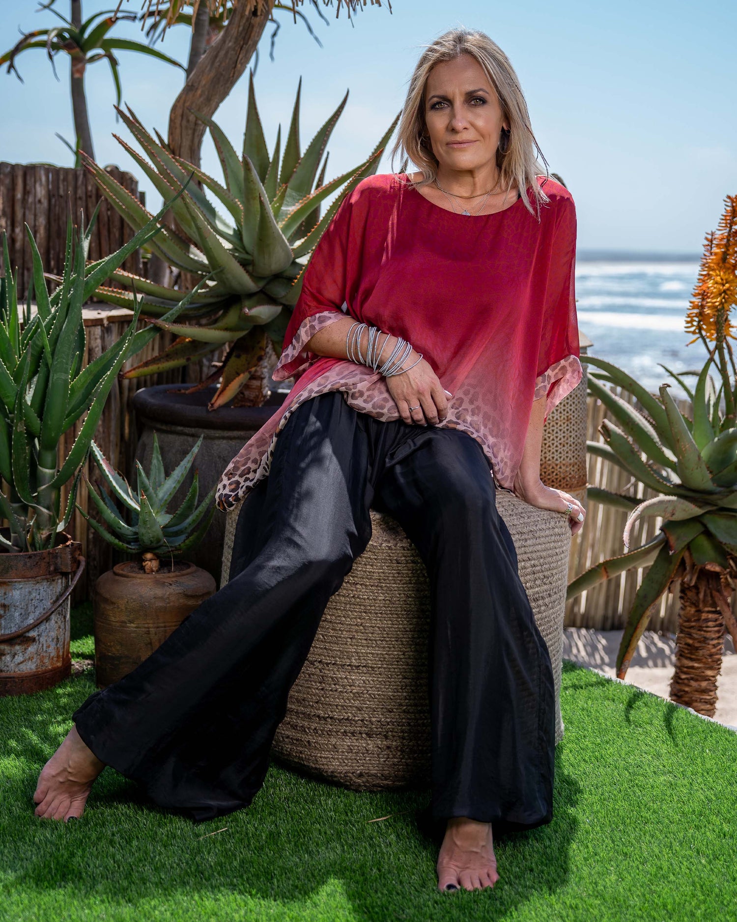 These pants move with you, ensuring all-day comfort without compromising on style.The outer lining crafted from luxurious silk blend adds a touch of sophistication and refinement to these bohemian-inspired pants. The silky smooth texture not only feels incredible against your skin but also elevates your look with a subtle sheen. Featuring a wide, stretchy waistband, these pants offer a secure and comfortable fit that flatters your figure and accentuates your waistline
