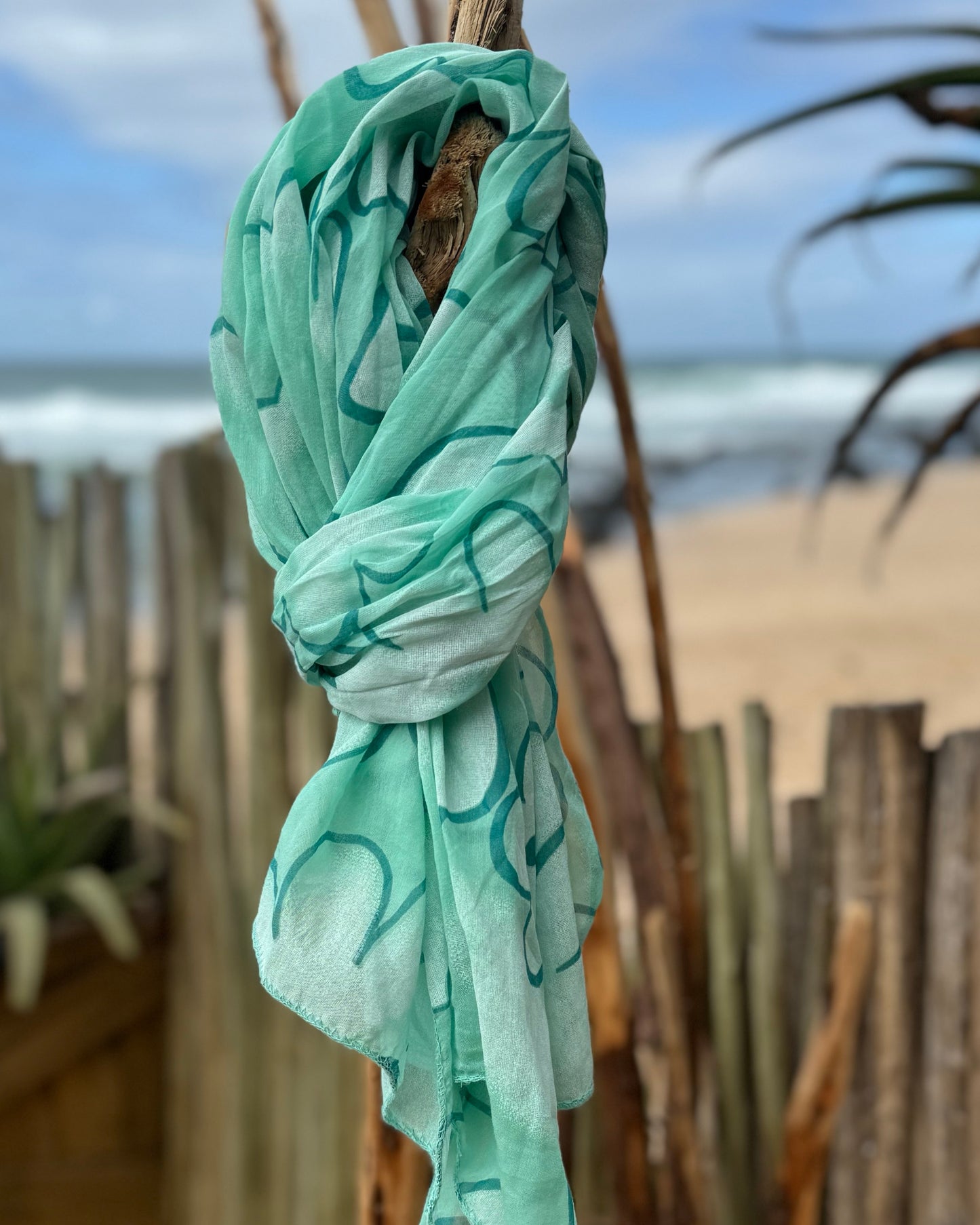 Infuse a burst of color and elegance into your wardrobe with our selection of summer scarves. Designed to brighten up any outfit, this scarf features a vibrant floral print that adds a fresh, lively touch to your look. Made from lightweight, breathable fabric, it drapes beautifully and provides just the right amount of warmth for those breezy summer days. Whether you’re dressing up a simple tee or adding flair to a sundress, this scarf is your go-to accessory for effortlessly elevating your style and embrac