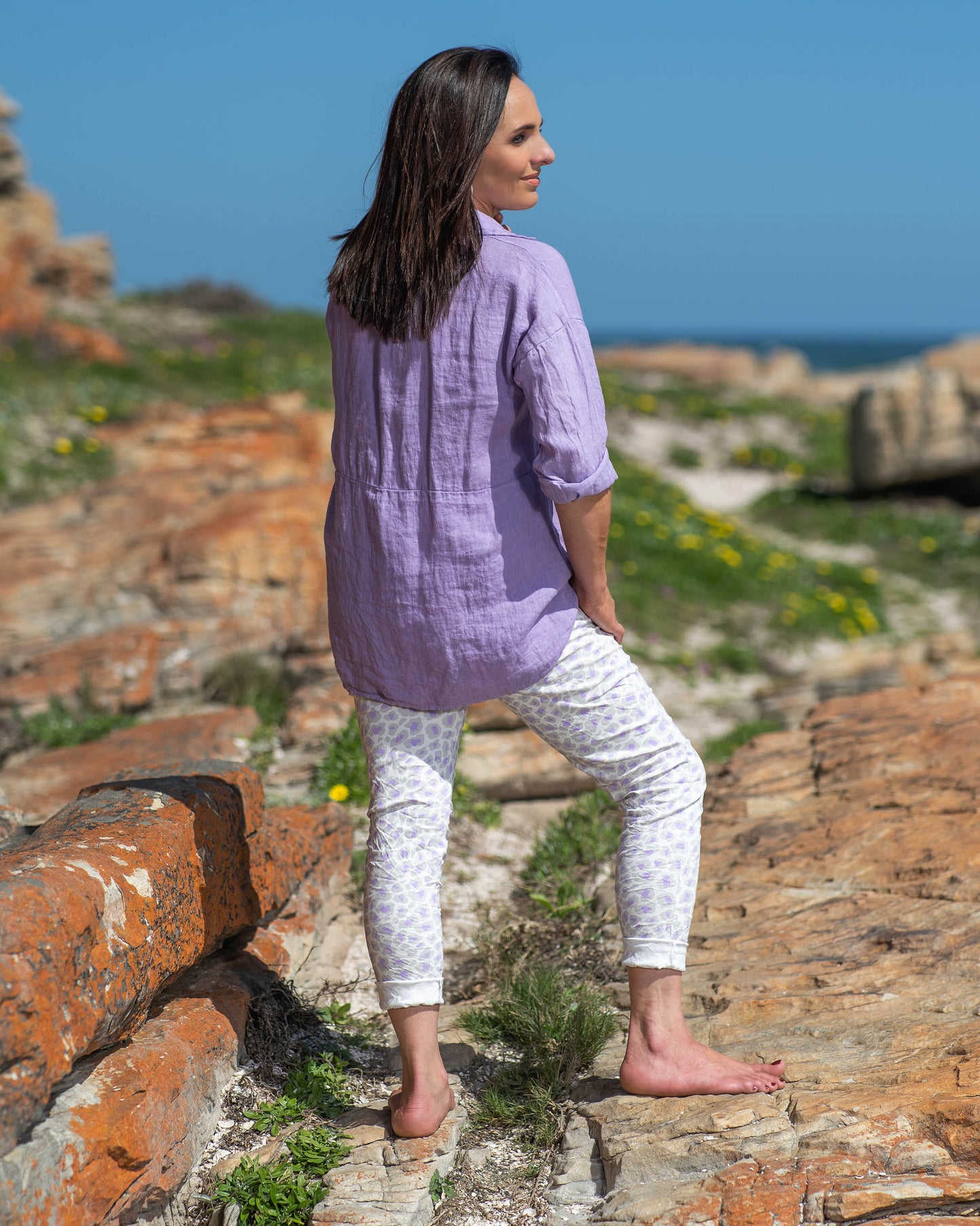 In a dreamy shade of Lavish Lavender, this top adds a touch of grace to any ensemble. The button-down design allows for versatile styling, whether you prefer a relaxed, open look or a neatly buttoned-up silhouette. It has a comfortable fit with a slight A-frame cut