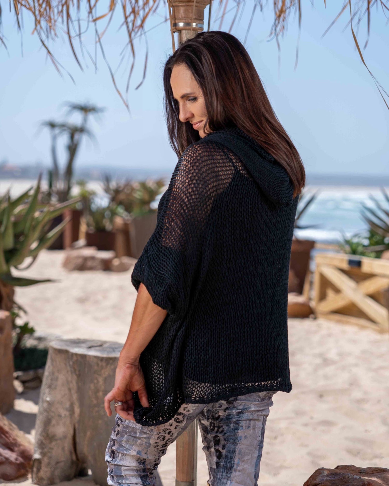 Designed for those who crave comfort without compromising style, this poncho is the ultimate statement piece for your wardrobe. Crafted from premium quality knit fabric, this poncho boasts a luxurious oversized silhouette that effortlessly drapes over your body, offering both warmth and elegance