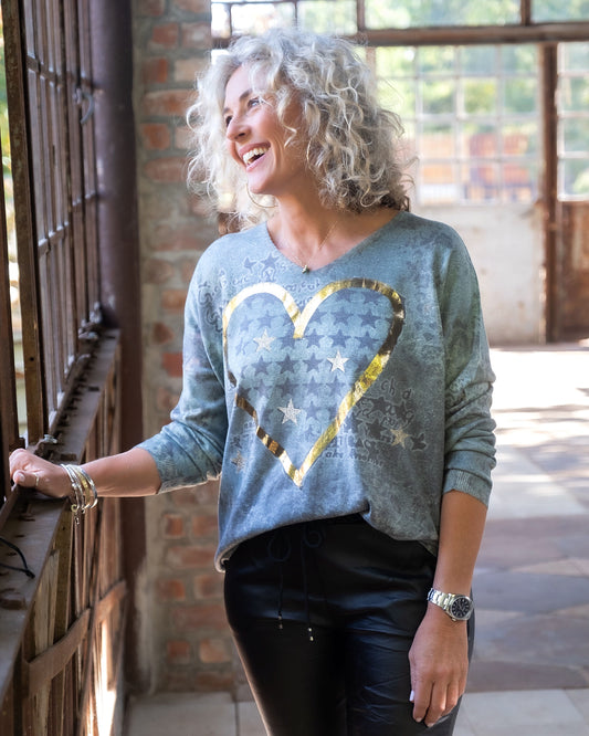 If you're looking for a statement piece that's both equally functional and beautiful - this one's for you! Featuring a captivating printed design adorned with a statement gold foil heart decal, soft and comfortable feel against your skin, ensuring all-day comfort without compromising on style