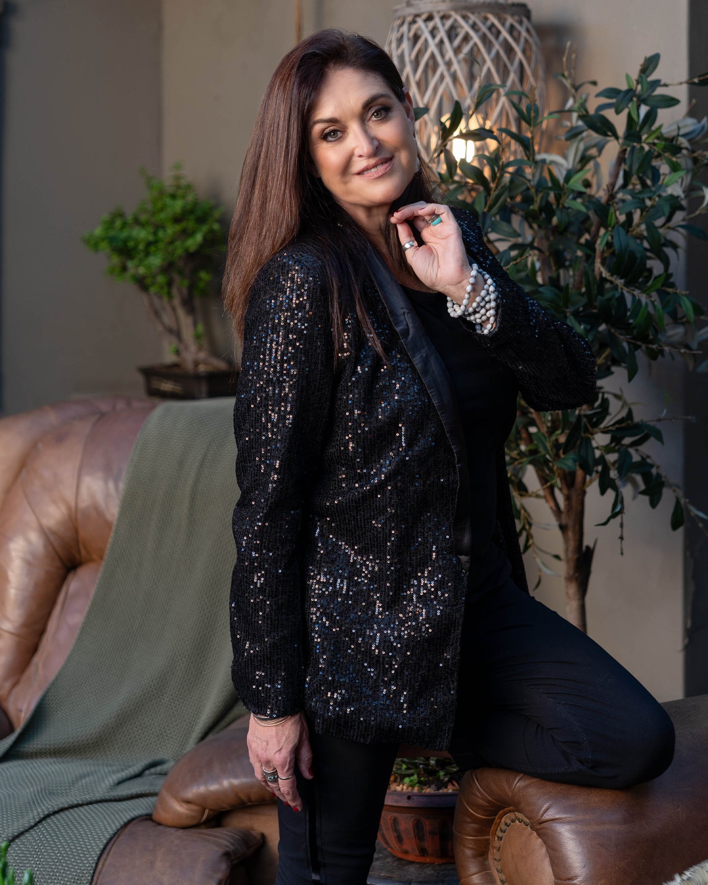 Our is the epitome of luxury fashion. Whether you're attending a gala, a party, or a stylish evening out, this blazer ensures you’ll be the center of attention. The combination of shimmering sequins and luxurious silk feel creates a stunning visual effect, while the tailored fit enhances your silhouette. Designed to flatter, this blazer features a structured silhouette with a slightly cinched waist, ensuring a chic and polished look