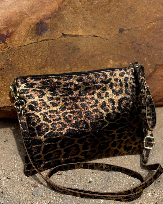 Elevate your style sustainably with our Genuine Leather Zip Sling Bag – A fashionable fusion of elegance!  Introducing our Genuine Leather Zip Sling Bag, meticulously crafted for sophistication. With lustrous gold zip detailing and an adjustable sling, this bag redefines fashion by prioritizing style