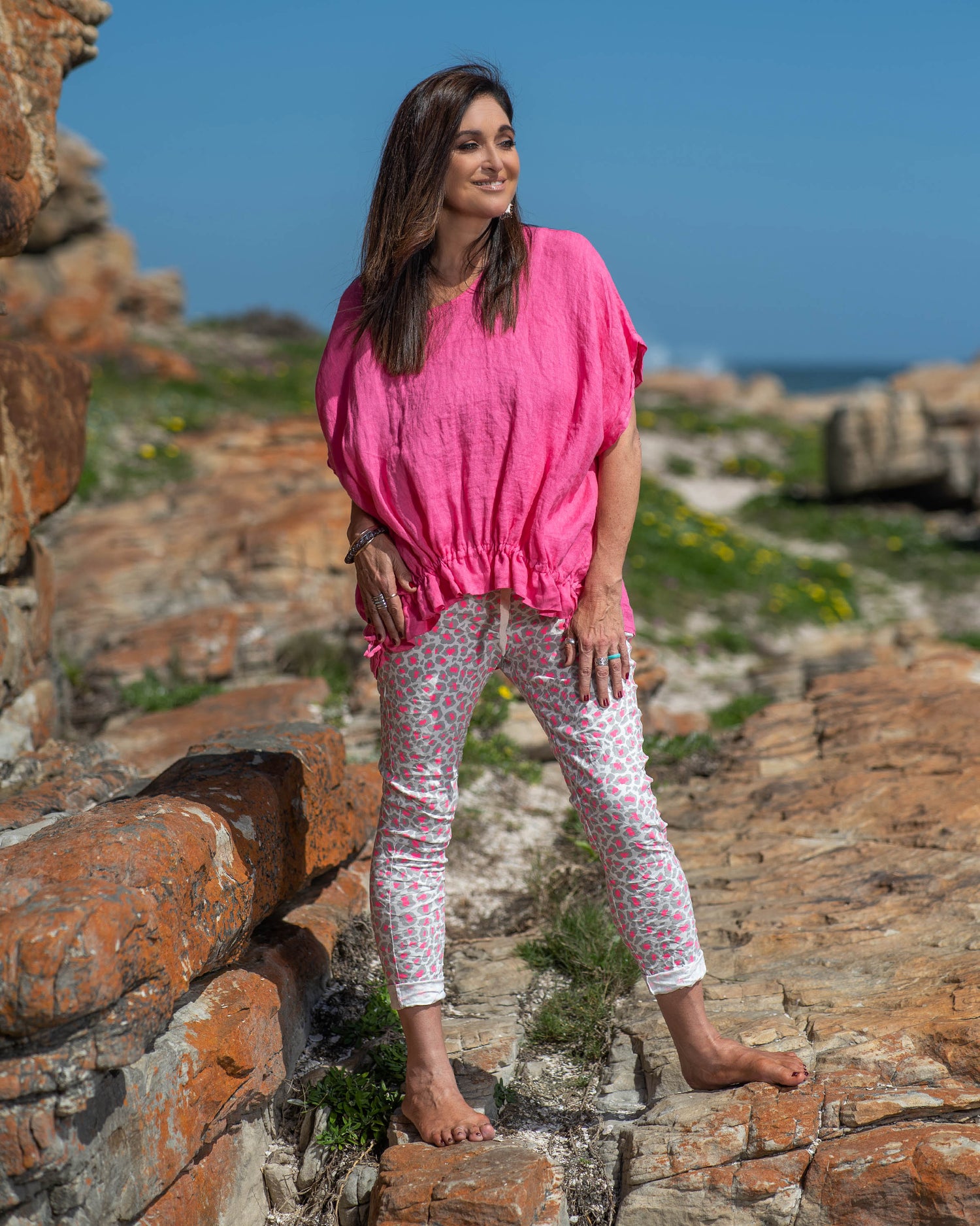 Step into the world of casual chic with this very comfortable, yet stylish linen top. What sets this top apart is its playful frill detailing, adding a touch of whimsy and femininity to your look. The natural, breathable linen fabric keeps you cool and fresh even on the warmest days, making it a must-have addition to your summer wardrobe