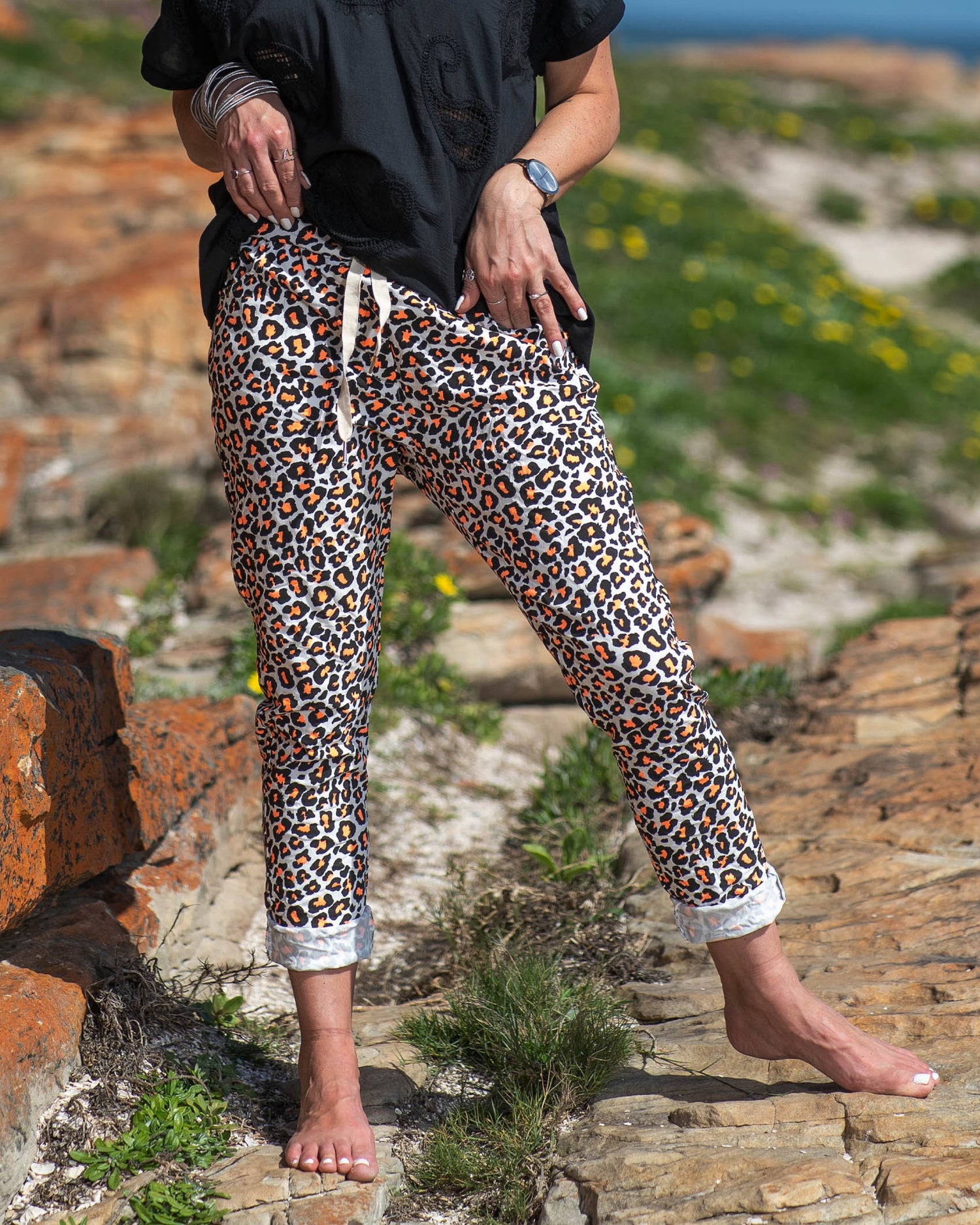 Available in a range of vibrant luminescence colors, these pants offer a fresh and modern twist on the classic leopard print pattern. The fusion of wild and vivid tones adds an electrifying touch, ensuring you stand out wherever you go