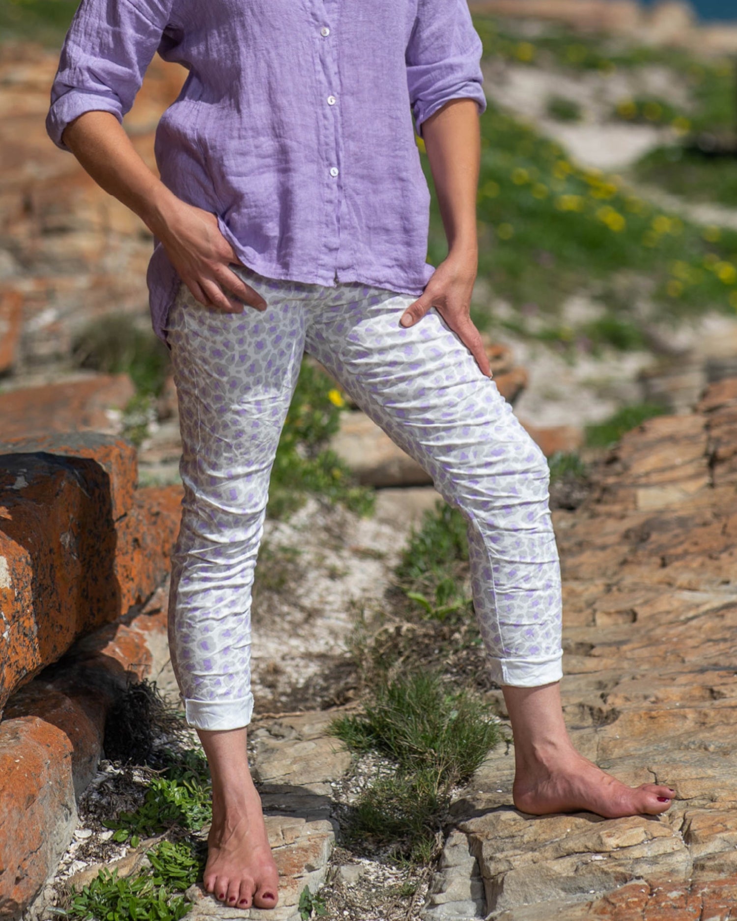 Available in a range of vibrant luminescence colors, these pants offer a fresh and modern twist on the classic leopard print pattern. The fusion of wild and vivid tones adds an electrifying touch, ensuring you stand out wherever you go