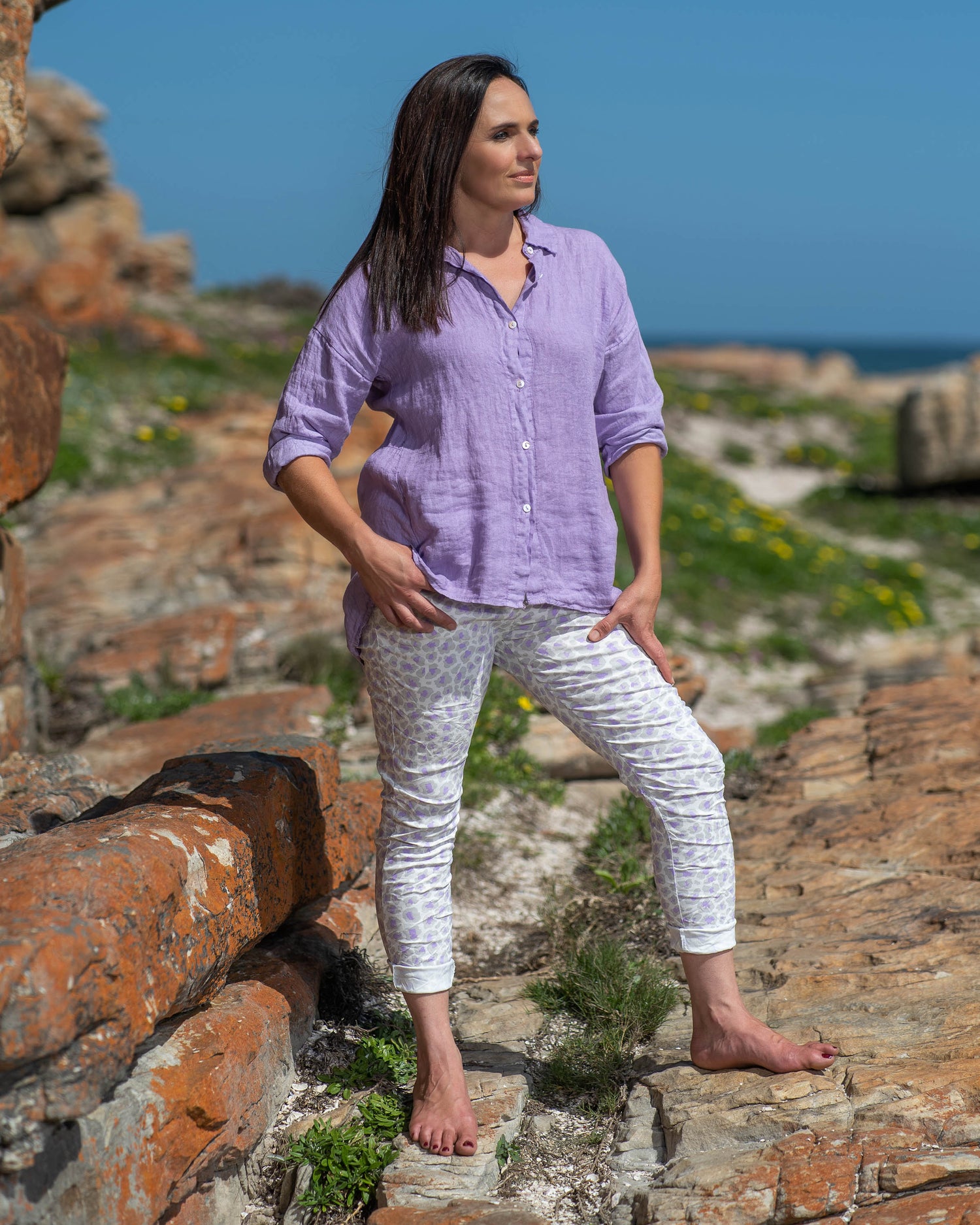 In a dreamy shade of Lavish Lavender, this top adds a touch of grace to any ensemble. The button-down design allows for versatile styling, whether you prefer a relaxed, open look or a neatly buttoned-up silhouette. It has a comfortable fit with a slight A-frame cut