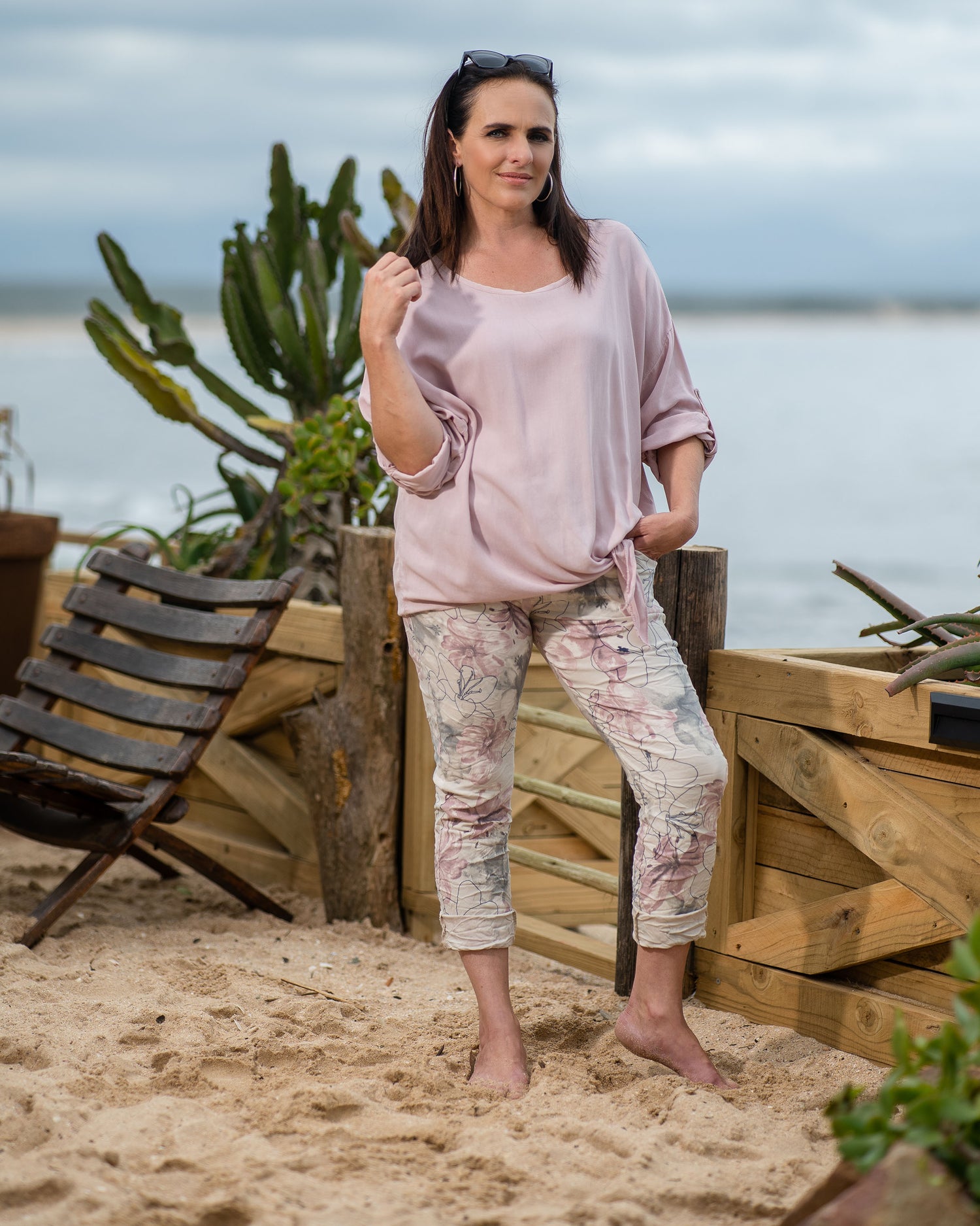 The batwing cut offers a relaxed and airy silhouette, ensuring a comfortable fit while adding a touch of contemporary flair. The round neck enhances the casual charm of the top. The unique front twist not only introduces a touch of creativity but also creates a flattering drape, enhancing the overall visual appeal