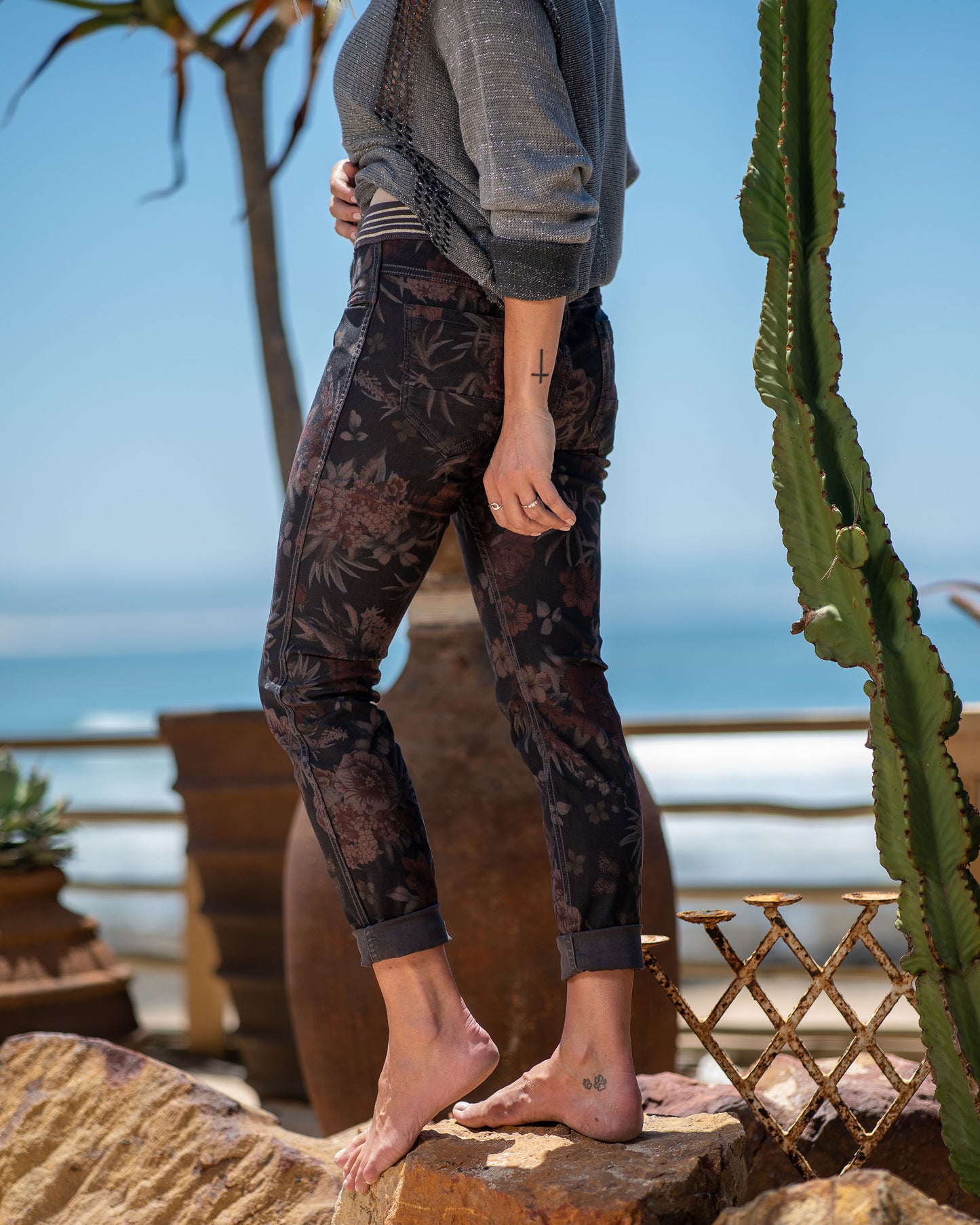 A single pair of Drawstring elasticated pants that effortlessly transitions from bold floral elegance to sleek block color, ensuring you're always ready for any fashion mood. On one side, embrace the vibrant beauty of nature with our eye-catching floral print. On the flip side, revel in the simplicity and sophistication of the block color design
