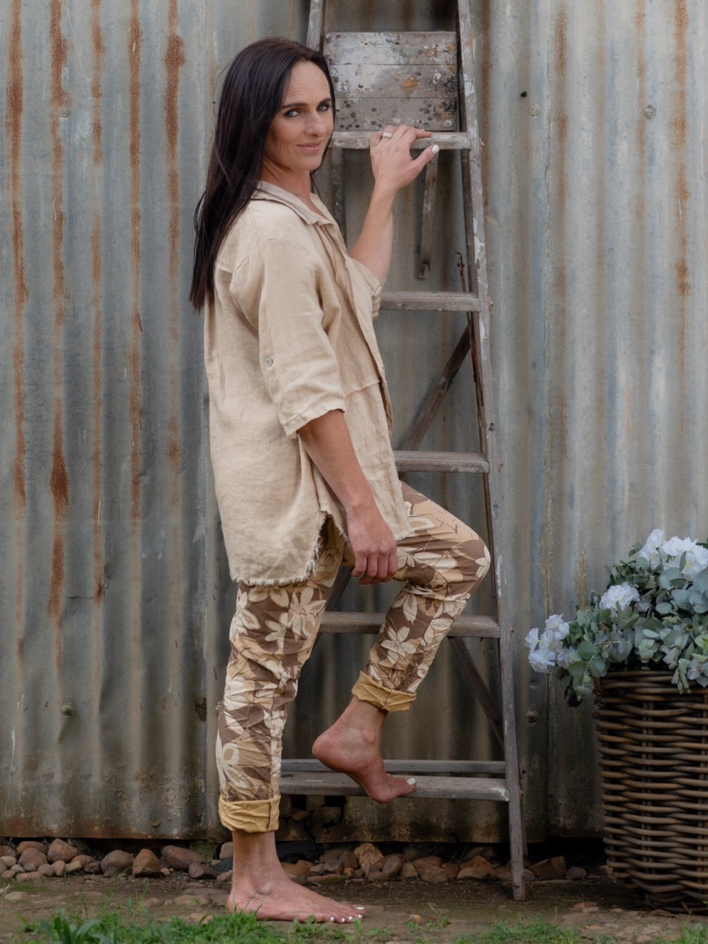 A bold flower print that brings a splash of color to any outfit. These pants are designed for those who love to express their personality through their wardrobe. The eye-catching floral pattern is enhanced by a blend of color hues, creating a lively look that’s perfect for any season.&nbsp;The elasticated waistband with a functional drawstring ensures a comfortable and adjustable fit, while the relaxed silhouette provides freedom of movement. These pants are not just about style; they’re also about ease, ma