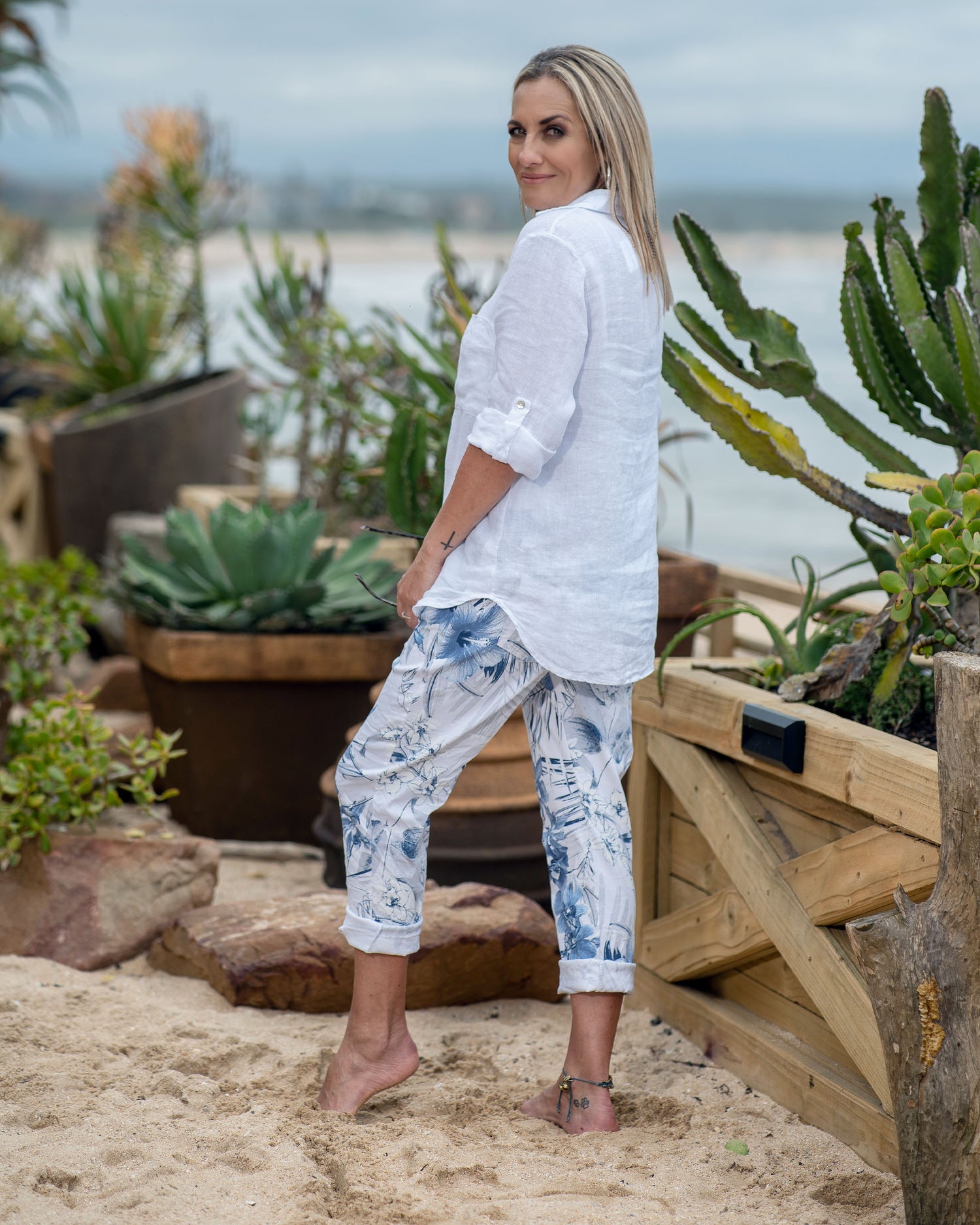 The 3/4 sleeves strike the perfect balance between coverage and breathability, making this top ideal for transitioning between seasons. Decorative front pocket that adds a subtle yet distinctive element to the design. Beautiful round cut hem adds a feminine touch