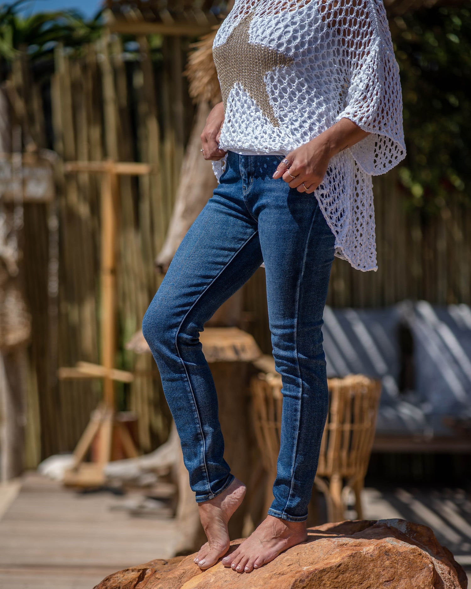 We all adore that one denim that is always your go-to pick when getting dressed!  Elevate your denim game with this chic and versatile pair, featuring a timeless straight cut and a touch of shimmering elegance with a silver foil print on the front. Superior comfort with stretch and a mid-rise on the waist line 
