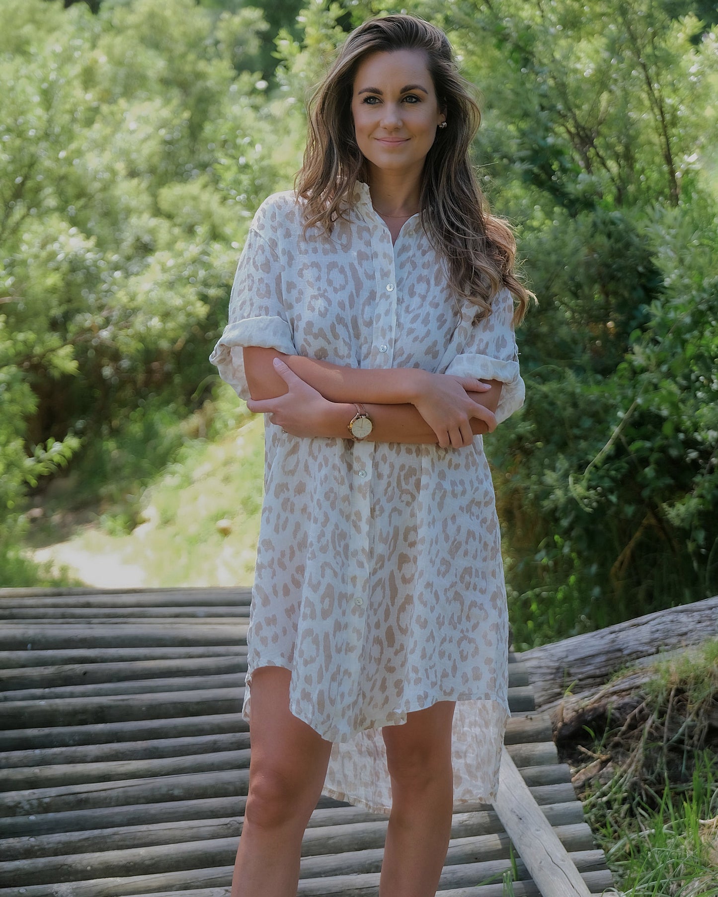 Embrace effortless elegance of this lovely linen dress. The subtle animal print, tastefully incorporated into the fabric, adds a hint of wild sophistication. Pair it with sandals and a sun hat for a relaxed daytime look or elevate it with heels and statement jewelry for a more formal affair