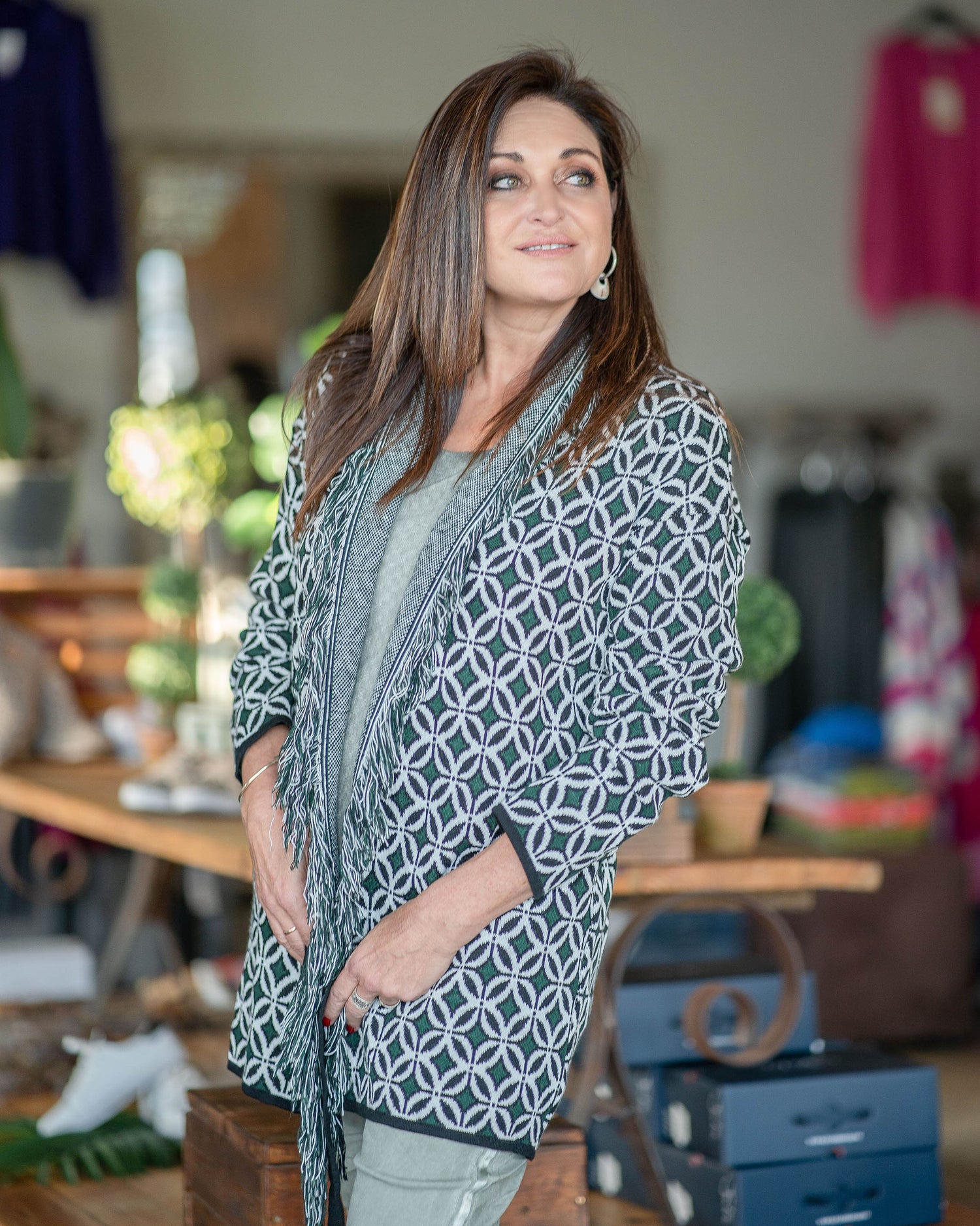 Once you try this poncho on - you wouldn't want to take it off! The colour scheme is vibrant and will easily pair with almost any outfit. The raw edge fringe detail adds so much sophistication to this look
