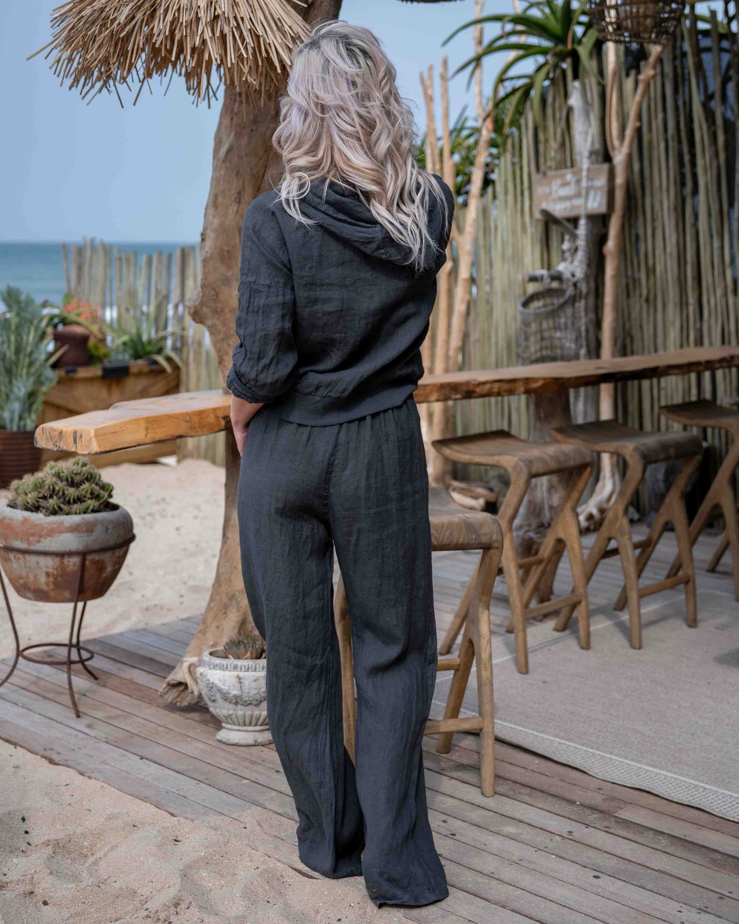 Even though summer is making its appearance it still gets chilly some time - which is why we love this light weight linen hoodie jacket. This casual yet stylish piece features a full front zipper for easy wear, two front pockets for convenience, and ribbed hem and cuffs for a snug, modern fit. Crafted from breathable linen, this hoodie jacket is perfect for layering and transitioning through the seasons, combining comfort with a relaxed, contemporary look