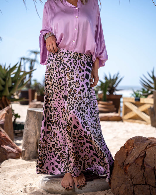 Featuring a timeless A-line silhouette, this skirt flatters every figure with its graceful flow and gentle sway. The A-line cut skims the hips and flares out slightly towards the hem, creating a beautifully feminine shape that accentuates your curves. Elasticated waistband ensures a comfortable fit throughout the day